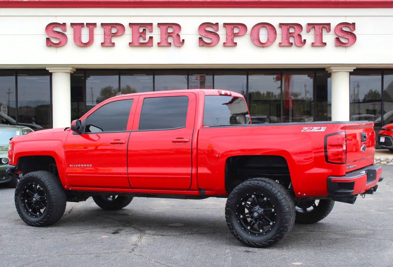 2017 Red Chevrolet Silverado 1500 LT Crew Cab 4WD (3GCUKREC4HG) with an EcoTec3 5.3L V8 355hp 383ft. lbs. 5.3L V8 engine, Automatic 6-Speed transmission, located at 4301 NW 39th , Oklahoma City, OK, 73112, (405) 949-5600, 35.512135, -97.598671 - Hablamos espanol. SPEND SMART --- BUY FROM SUPER SPORTS. ALL PRICES, DOWN PAYMENTS, PAYMENTS, AND FINANCE TERMS ARE NEGOTIABLE AT THE TIME OF APPROVAL. WE WILL WORK WITH YOU TO FIT YOUR BUDGET. WE WILL EVEN LOWER AND ADJUST THE NUMBERS TO HELP MAKE THE VE HICLE MORE AFFORDABLE FOR YOU.- Photo#4