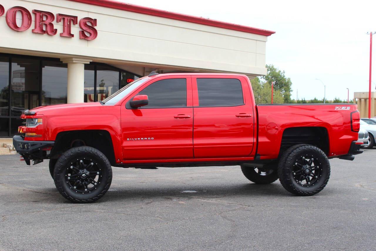 2017 Red Chevrolet Silverado 1500 LT Crew Cab 4WD (3GCUKREC4HG) with an EcoTec3 5.3L V8 355hp 383ft. lbs. 5.3L V8 engine, Automatic 6-Speed transmission, located at 4301 NW 39th , Oklahoma City, OK, 73112, (405) 949-5600, 35.512135, -97.598671 - Hablamos espanol. SPEND SMART --- BUY FROM SUPER SPORTS. ALL PRICES, DOWN PAYMENTS, PAYMENTS, AND FINANCE TERMS ARE NEGOTIABLE AT THE TIME OF APPROVAL. WE WILL WORK WITH YOU TO FIT YOUR BUDGET. WE WILL EVEN LOWER AND ADJUST THE NUMBERS TO HELP MAKE THE VE HICLE MORE AFFORDABLE FOR YOU.- Photo#5