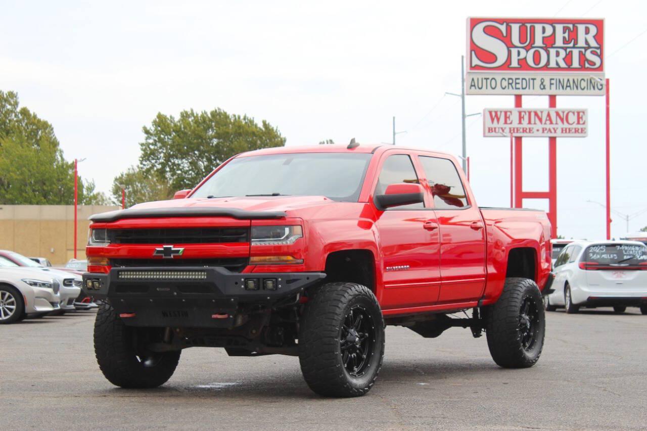 2017 Red Chevrolet Silverado 1500 LT Crew Cab 4WD (3GCUKREC4HG) with an EcoTec3 5.3L V8 355hp 383ft. lbs. 5.3L V8 engine, Automatic 6-Speed transmission, located at 4301 NW 39th , Oklahoma City, OK, 73112, (405) 949-5600, 35.512135, -97.598671 - Hablamos espanol. SPEND SMART --- BUY FROM SUPER SPORTS. ALL PRICES, DOWN PAYMENTS, PAYMENTS, AND FINANCE TERMS ARE NEGOTIABLE AT THE TIME OF APPROVAL. WE WILL WORK WITH YOU TO FIT YOUR BUDGET. WE WILL EVEN LOWER AND ADJUST THE NUMBERS TO HELP MAKE THE VE HICLE MORE AFFORDABLE FOR YOU.- Photo#6