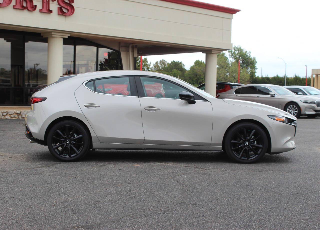 2026 Tan Mazda Mazda3 Hatchback Select Sport (JM1BPAKL9T1) with an SKYACTIV-G 2.5L I4 186hp 186ft. lbs. 2.5L I4 engine, Automatic 6-Speed transmission, located at 4301 NW 39th , Oklahoma City, OK, 73112, (405) 949-5600, 35.512135, -97.598671 - Hablamos espanol. SPEND SMART --- BUY FROM SUPER SPORTS. ALL PRICES, DOWN PAYMENTS, PAYMENTS, AND FINANCE TERMS ARE NEGOTIABLE AT THE TIME OF APPROVAL. WE WILL WORK WITH YOU TO FIT YOUR BUDGET. WE WILL EVEN LOWER AND ADJUST THE NUMBERS TO HELP MAKE THE VEHICLE MORE AFFORDABLE FOR YOU.- Photo#2