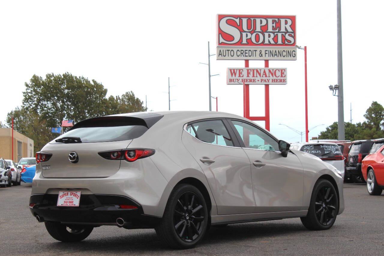 2026 Tan Mazda Mazda3 Hatchback Select Sport (JM1BPAKL9T1) with an SKYACTIV-G 2.5L I4 186hp 186ft. lbs. 2.5L I4 engine, Automatic 6-Speed transmission, located at 4301 NW 39th , Oklahoma City, OK, 73112, (405) 949-5600, 35.512135, -97.598671 - Hablamos espanol. SPEND SMART --- BUY FROM SUPER SPORTS. ALL PRICES, DOWN PAYMENTS, PAYMENTS, AND FINANCE TERMS ARE NEGOTIABLE AT THE TIME OF APPROVAL. WE WILL WORK WITH YOU TO FIT YOUR BUDGET. WE WILL EVEN LOWER AND ADJUST THE NUMBERS TO HELP MAKE THE VEHICLE MORE AFFORDABLE FOR YOU.- Photo#3