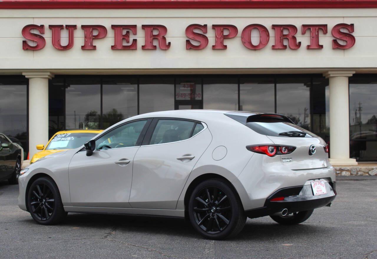 2026 Tan Mazda Mazda3 Hatchback Select Sport (JM1BPAKL9T1) with an SKYACTIV-G 2.5L I4 186hp 186ft. lbs. 2.5L I4 engine, Automatic 6-Speed transmission, located at 4301 NW 39th , Oklahoma City, OK, 73112, (405) 949-5600, 35.512135, -97.598671 - Hablamos espanol. SPEND SMART --- BUY FROM SUPER SPORTS. ALL PRICES, DOWN PAYMENTS, PAYMENTS, AND FINANCE TERMS ARE NEGOTIABLE AT THE TIME OF APPROVAL. WE WILL WORK WITH YOU TO FIT YOUR BUDGET. WE WILL EVEN LOWER AND ADJUST THE NUMBERS TO HELP MAKE THE VEHICLE MORE AFFORDABLE FOR YOU.- Photo#4