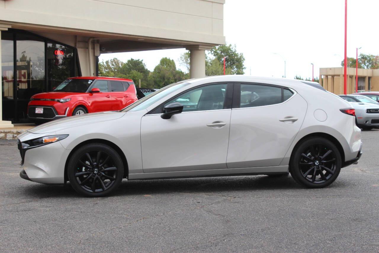 2026 Tan Mazda Mazda3 Hatchback Select Sport (JM1BPAKL9T1) with an SKYACTIV-G 2.5L I4 186hp 186ft. lbs. 2.5L I4 engine, Automatic 6-Speed transmission, located at 4301 NW 39th , Oklahoma City, OK, 73112, (405) 949-5600, 35.512135, -97.598671 - Hablamos espanol. SPEND SMART --- BUY FROM SUPER SPORTS. ALL PRICES, DOWN PAYMENTS, PAYMENTS, AND FINANCE TERMS ARE NEGOTIABLE AT THE TIME OF APPROVAL. WE WILL WORK WITH YOU TO FIT YOUR BUDGET. WE WILL EVEN LOWER AND ADJUST THE NUMBERS TO HELP MAKE THE VEHICLE MORE AFFORDABLE FOR YOU.- Photo#5