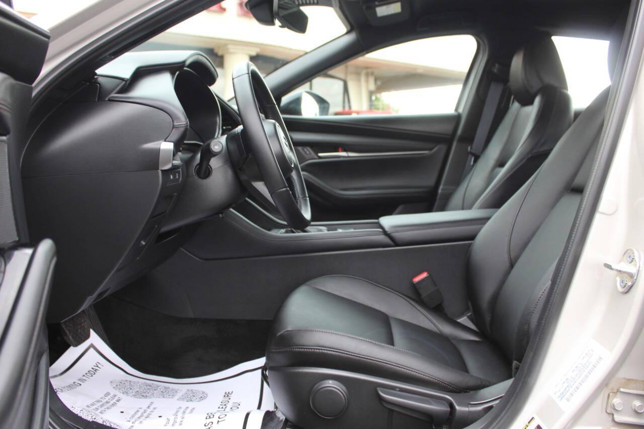 2026 Tan Mazda Mazda3 Hatchback Select Sport (JM1BPAKL9T1) with an SKYACTIV-G 2.5L I4 186hp 186ft. lbs. 2.5L I4 engine, Automatic 6-Speed transmission, located at 4301 NW 39th , Oklahoma City, OK, 73112, (405) 949-5600, 35.512135, -97.598671 - Hablamos espanol. SPEND SMART --- BUY FROM SUPER SPORTS. ALL PRICES, DOWN PAYMENTS, PAYMENTS, AND FINANCE TERMS ARE NEGOTIABLE AT THE TIME OF APPROVAL. WE WILL WORK WITH YOU TO FIT YOUR BUDGET. WE WILL EVEN LOWER AND ADJUST THE NUMBERS TO HELP MAKE THE VEHICLE MORE AFFORDABLE FOR YOU.- Photo#13