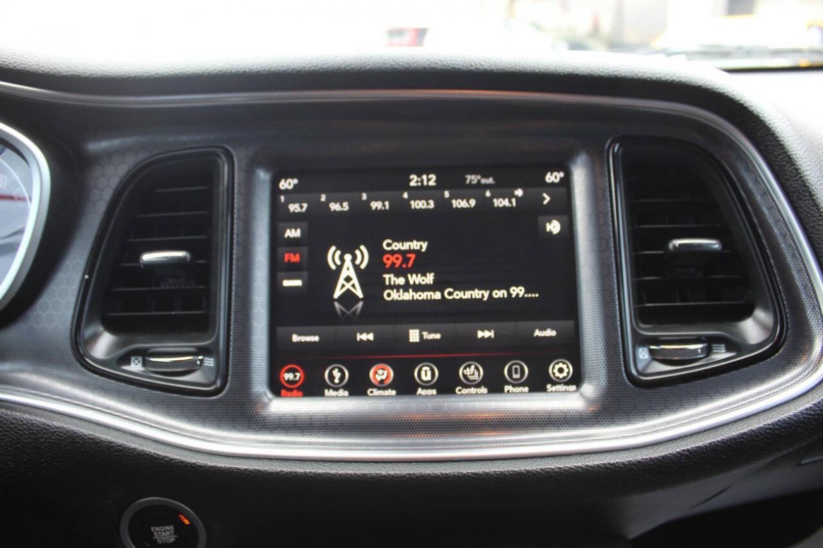 2018 White Dodge Challenger SXT (2C3CDZAG6JH) with an Pentastar 3.6L V6 305hp 268ft. lbs. 3.6L V6 engine, Automatic 8-Speed transmission, located at 4301 NW 39th , Oklahoma City, OK, 73112, (405) 949-5600, 35.512135, -97.598671 - Hablamos espanol. SPEND SMART --- BUY FROM SUPER SPORTS. ALL PRICES, DOWN PAYMENTS, PAYMENTS, AND FINANCE TERMS ARE NEGOTIABLE AT THE TIME OF APPROVAL. WE WILL WORK WITH YOU TO FIT YOUR BUDGET. WE WILL EVEN LOWER AND ADJUST THE NUMBERS TO HELP MAKE THE VE HICLE MORE AFFORDABLE FOR YOU.- Photo#16