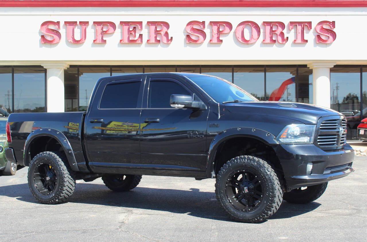 2015 Black RAM 1500 Sport Crew Cab SWB 4WD (1C6RR7MT9FS) with an HEMI 5.7L V8 395hp 410ft. lbs. 5.7L V8 engine, Automatic 8-Speed transmission, located at 4301 NW 39th , Oklahoma City, OK, 73112, (405) 949-5600, 35.512135, -97.598671 - Hablamos espanol. SPEND SMART --- BUY FROM SUPER SPORTS. ALL PRICES, DOWN PAYMENTS, PAYMENTS, AND FINANCE TERMS ARE NEGOTIABLE AT THE TIME OF APPROVAL. WE WILL WORK WITH YOU TO FIT YOUR BUDGET. WE WILL EVEN LOWER AND ADJUST THE NUMBERS TO HELP MAKE THE VE HICLE MORE AFFORDABLE FOR YOU.- Photo#0