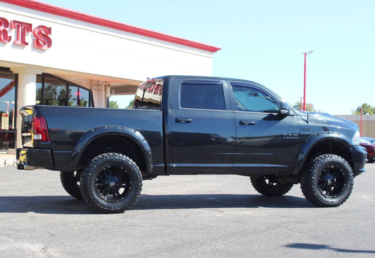 2015 Black RAM 1500 Sport Crew Cab SWB 4WD (1C6RR7MT9FS) with an HEMI 5.7L V8 395hp 410ft. lbs. 5.7L V8 engine, Automatic 8-Speed transmission, located at 4301 NW 39th , Oklahoma City, OK, 73112, (405) 949-5600, 35.512135, -97.598671 - Hablamos espanol. SPEND SMART --- BUY FROM SUPER SPORTS. ALL PRICES, DOWN PAYMENTS, PAYMENTS, AND FINANCE TERMS ARE NEGOTIABLE AT THE TIME OF APPROVAL. WE WILL WORK WITH YOU TO FIT YOUR BUDGET. WE WILL EVEN LOWER AND ADJUST THE NUMBERS TO HELP MAKE THE VE HICLE MORE AFFORDABLE FOR YOU.- Photo#2