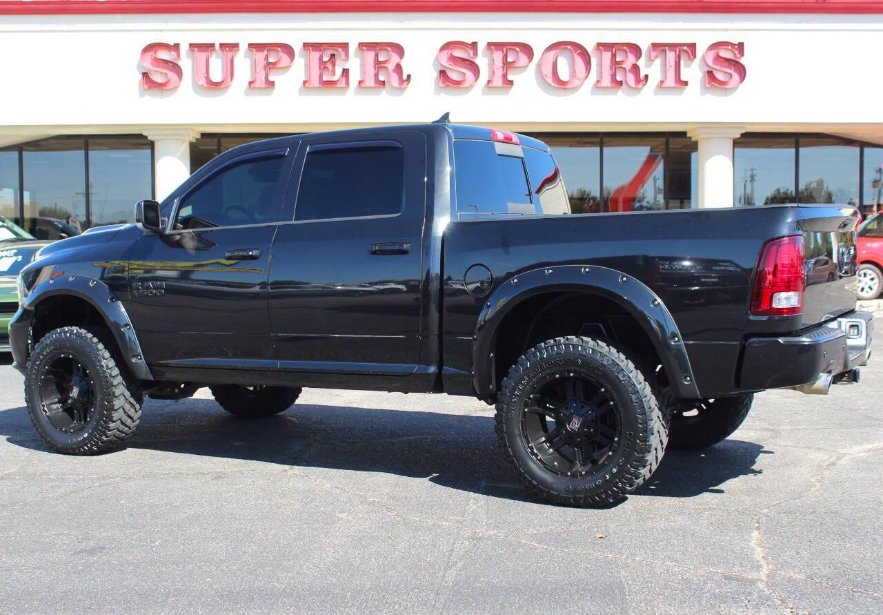 2015 Black RAM 1500 Sport Crew Cab SWB 4WD (1C6RR7MT9FS) with an HEMI 5.7L V8 395hp 410ft. lbs. 5.7L V8 engine, Automatic 8-Speed transmission, located at 4301 NW 39th , Oklahoma City, OK, 73112, (405) 949-5600, 35.512135, -97.598671 - Hablamos espanol. SPEND SMART --- BUY FROM SUPER SPORTS. ALL PRICES, DOWN PAYMENTS, PAYMENTS, AND FINANCE TERMS ARE NEGOTIABLE AT THE TIME OF APPROVAL. WE WILL WORK WITH YOU TO FIT YOUR BUDGET. WE WILL EVEN LOWER AND ADJUST THE NUMBERS TO HELP MAKE THE VE HICLE MORE AFFORDABLE FOR YOU.- Photo#4