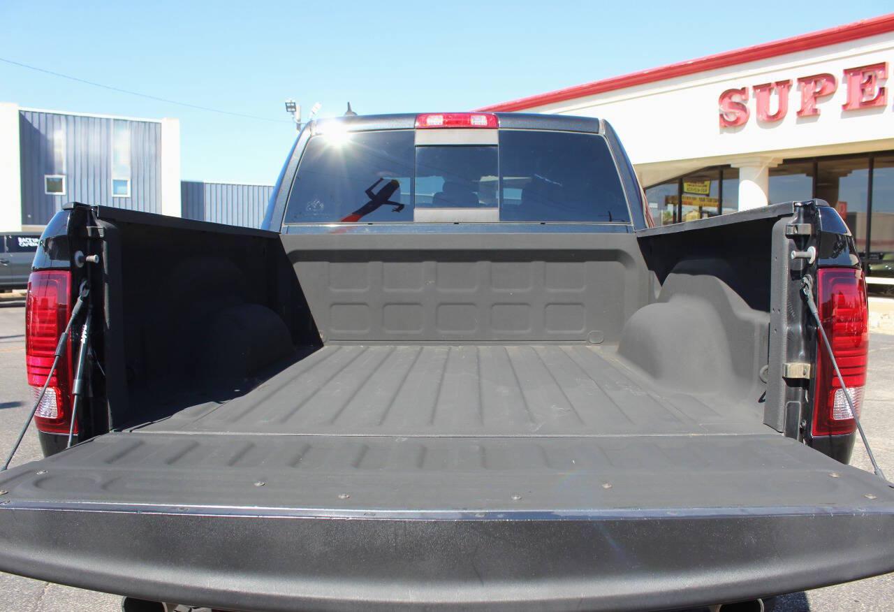 2015 Black RAM 1500 Sport Crew Cab SWB 4WD (1C6RR7MT9FS) with an HEMI 5.7L V8 395hp 410ft. lbs. 5.7L V8 engine, Automatic 8-Speed transmission, located at 4301 NW 39th , Oklahoma City, OK, 73112, (405) 949-5600, 35.512135, -97.598671 - Hablamos espanol. SPEND SMART --- BUY FROM SUPER SPORTS. ALL PRICES, DOWN PAYMENTS, PAYMENTS, AND FINANCE TERMS ARE NEGOTIABLE AT THE TIME OF APPROVAL. WE WILL WORK WITH YOU TO FIT YOUR BUDGET. WE WILL EVEN LOWER AND ADJUST THE NUMBERS TO HELP MAKE THE VE HICLE MORE AFFORDABLE FOR YOU.- Photo#11