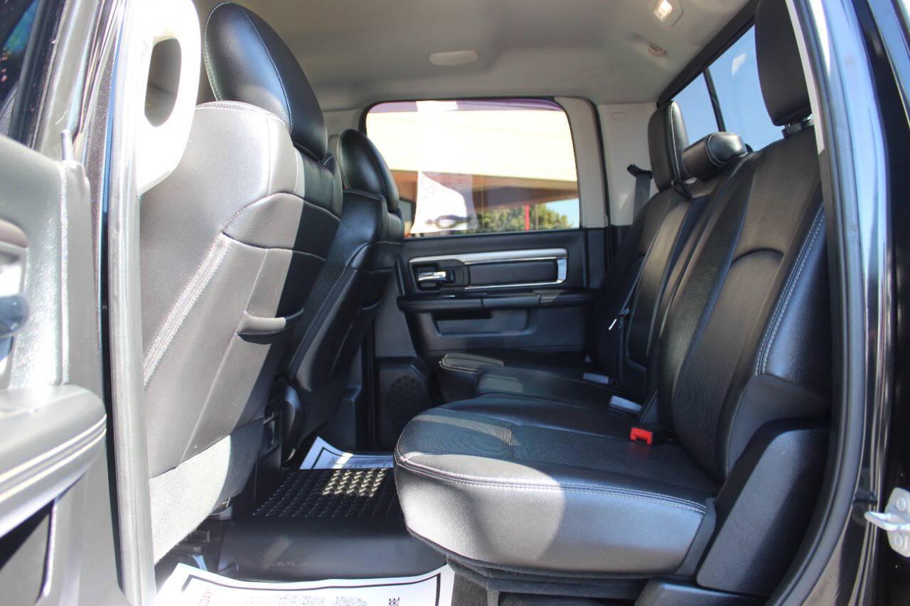 2015 Black RAM 1500 Sport Crew Cab SWB 4WD (1C6RR7MT9FS) with an HEMI 5.7L V8 395hp 410ft. lbs. 5.7L V8 engine, Automatic 8-Speed transmission, located at 4301 NW 39th , Oklahoma City, OK, 73112, (405) 949-5600, 35.512135, -97.598671 - Hablamos espanol. SPEND SMART --- BUY FROM SUPER SPORTS. ALL PRICES, DOWN PAYMENTS, PAYMENTS, AND FINANCE TERMS ARE NEGOTIABLE AT THE TIME OF APPROVAL. WE WILL WORK WITH YOU TO FIT YOUR BUDGET. WE WILL EVEN LOWER AND ADJUST THE NUMBERS TO HELP MAKE THE VE HICLE MORE AFFORDABLE FOR YOU.- Photo#13