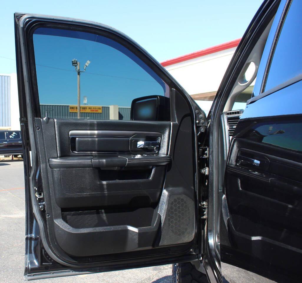 2015 Black RAM 1500 Sport Crew Cab SWB 4WD (1C6RR7MT9FS) with an HEMI 5.7L V8 395hp 410ft. lbs. 5.7L V8 engine, Automatic 8-Speed transmission, located at 4301 NW 39th , Oklahoma City, OK, 73112, (405) 949-5600, 35.512135, -97.598671 - Hablamos espanol. SPEND SMART --- BUY FROM SUPER SPORTS. ALL PRICES, DOWN PAYMENTS, PAYMENTS, AND FINANCE TERMS ARE NEGOTIABLE AT THE TIME OF APPROVAL. WE WILL WORK WITH YOU TO FIT YOUR BUDGET. WE WILL EVEN LOWER AND ADJUST THE NUMBERS TO HELP MAKE THE VE HICLE MORE AFFORDABLE FOR YOU.- Photo#14