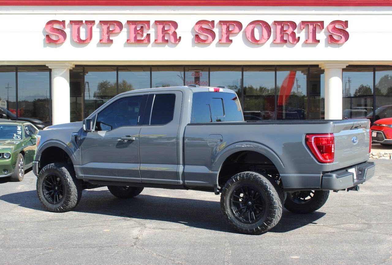 2021 Gray Ford F-150 Lariat SuperCab 6.5-ft. 4WD (1FTFX1E54MK) with an 5.0L Flex Fuel V8 400hp 410ft. lbs. 5.0L V8 engine, Automatic 10-Speed transmission, located at 4301 NW 39th , Oklahoma City, OK, 73112, (405) 949-5600, 35.512135, -97.598671 - Hablamos espanol. SPEND SMART --- BUY FROM SUPER SPORTS. ALL PRICES, DOWN PAYMENTS, PAYMENTS, AND FINANCE TERMS ARE NEGOTIABLE AT THE TIME OF APPROVAL. WE WILL WORK WITH YOU TO FIT YOUR BUDGET. WE WILL EVEN LOWER AND ADJUST THE NUMBERS TO HELP MAKE THE VE HICLE MORE AFFORDABLE FOR YOU.- Photo#4