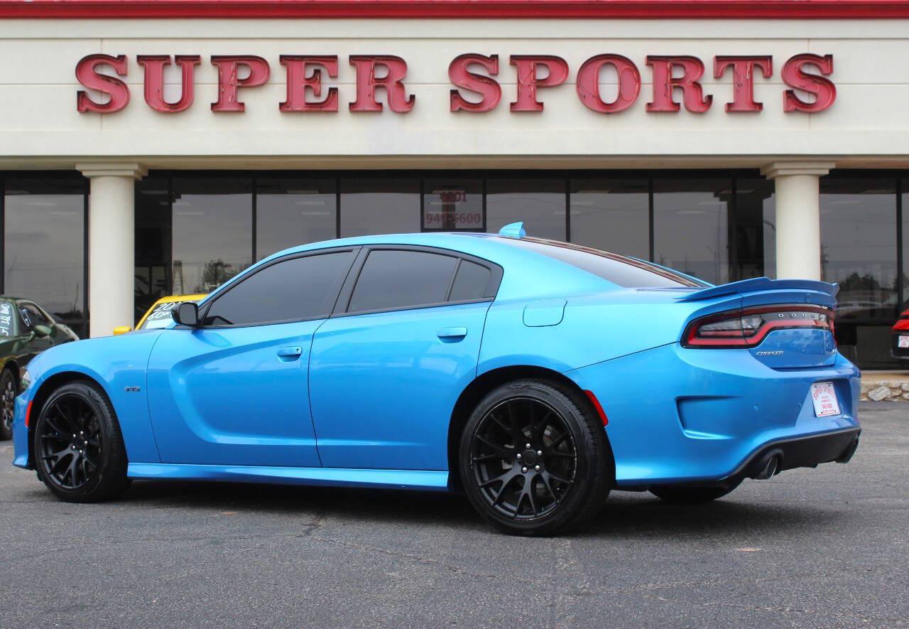 2023 Blue Dodge Charger R/T (2C3CDXCT4PH) with an HEMI 5.7L V8 370hp 395ft. lbs. 5.7L V8 engine, Automatic 8-Speed transmission, located at 4301 NW 39th , Oklahoma City, OK, 73112, (405) 949-5600, 35.512135, -97.598671 - Hablamos espanol. SPEND SMART --- BUY FROM SUPER SPORTS. ALL PRICES, DOWN PAYMENTS, PAYMENTS, AND FINANCE TERMS ARE NEGOTIABLE AT THE TIME OF APPROVAL. WE WILL WORK WITH YOU TO FIT YOUR BUDGET. WE WILL EVEN LOWER AND ADJUST THE NUMBERS TO HELP MAKE THE VEHICLE MORE AFFORDABLE FOR YOU.- Photo#4