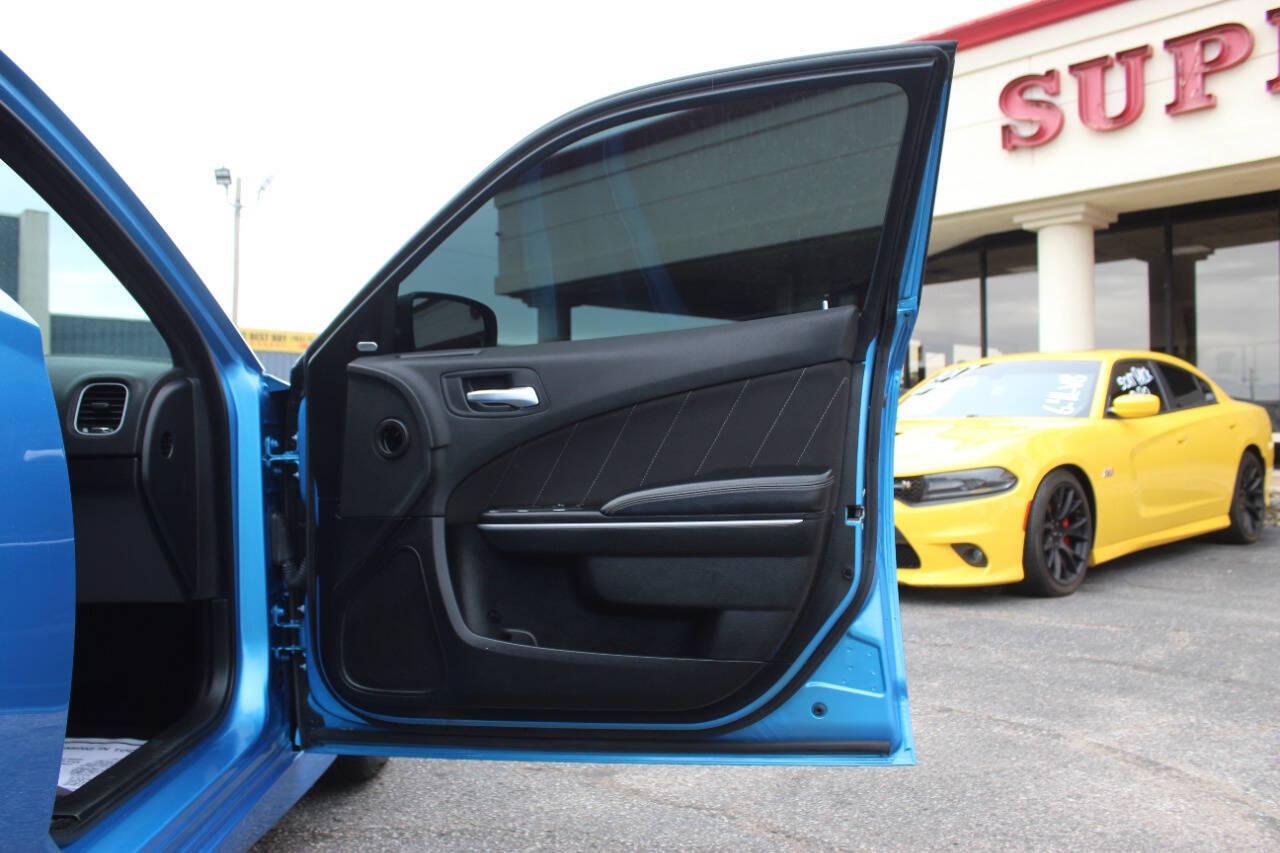 2023 Blue Dodge Charger R/T (2C3CDXCT4PH) with an HEMI 5.7L V8 370hp 395ft. lbs. 5.7L V8 engine, Automatic 8-Speed transmission, located at 4301 NW 39th , Oklahoma City, OK, 73112, (405) 949-5600, 35.512135, -97.598671 - Hablamos espanol. SPEND SMART --- BUY FROM SUPER SPORTS. ALL PRICES, DOWN PAYMENTS, PAYMENTS, AND FINANCE TERMS ARE NEGOTIABLE AT THE TIME OF APPROVAL. WE WILL WORK WITH YOU TO FIT YOUR BUDGET. WE WILL EVEN LOWER AND ADJUST THE NUMBERS TO HELP MAKE THE VEHICLE MORE AFFORDABLE FOR YOU.- Photo#8