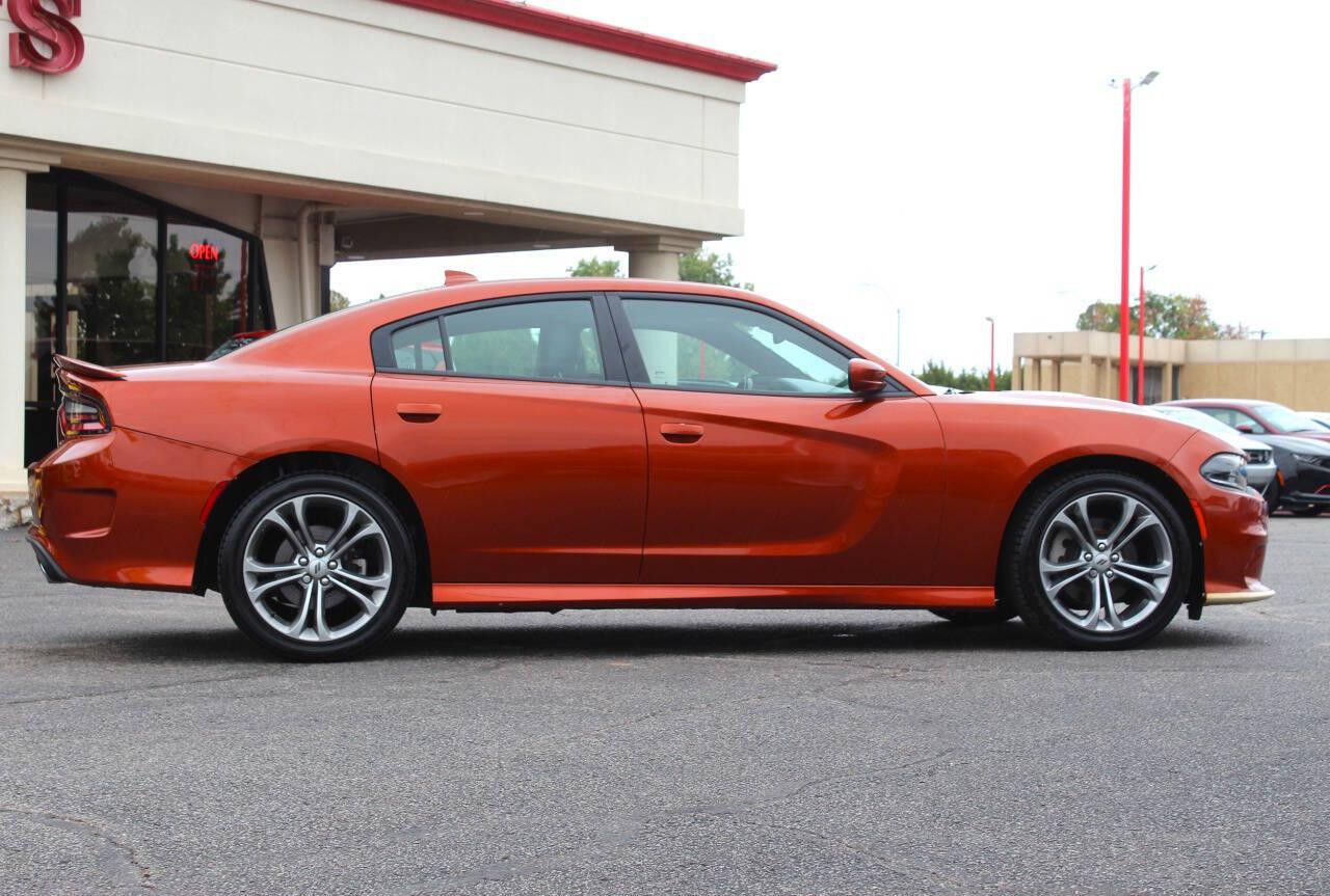 2021 Orange Dodge Charger GT AWD (2C3CDXHG3MH) with an Pentastar 3.6L V6 300hp 264ft. lbs. 3.6L V6 engine, Automatic 8-Speed transmission, located at 4301 NW 39th , Oklahoma City, OK, 73112, (405) 949-5600, 35.512135, -97.598671 - SPEND SMART --- BUY FROM SUPER SPORTS. ALL PRICES, DOWN PAYMENTS, PAYMENTS, AND FINANCE TERMS ARE NEGOTIABLE AT THE TIME OF APPROVAL. WE WILL WORK WITH YOU TO FIT YOUR BUDGET. WE WILL EVEN LOWER AND ADJUST THE NUMBERS TO HELP MAKE THE VEHICLE MORE AFFORDABLE FOR YOU. Our financing progra- Photo#2
