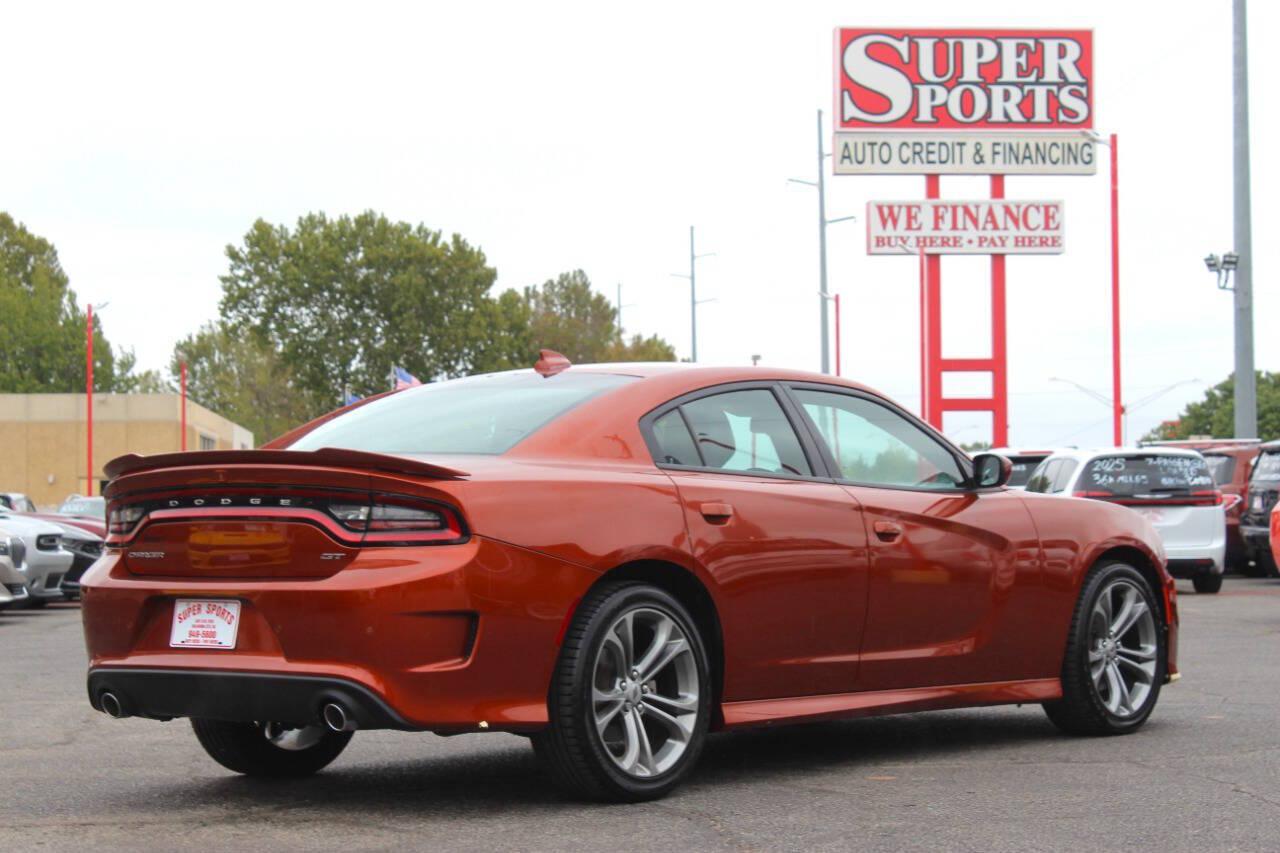 2021 Orange Dodge Charger GT AWD (2C3CDXHG3MH) with an Pentastar 3.6L V6 300hp 264ft. lbs. 3.6L V6 engine, Automatic 8-Speed transmission, located at 4301 NW 39th , Oklahoma City, OK, 73112, (405) 949-5600, 35.512135, -97.598671 - SPEND SMART --- BUY FROM SUPER SPORTS. ALL PRICES, DOWN PAYMENTS, PAYMENTS, AND FINANCE TERMS ARE NEGOTIABLE AT THE TIME OF APPROVAL. WE WILL WORK WITH YOU TO FIT YOUR BUDGET. WE WILL EVEN LOWER AND ADJUST THE NUMBERS TO HELP MAKE THE VEHICLE MORE AFFORDABLE FOR YOU. Our financing progra- Photo#3
