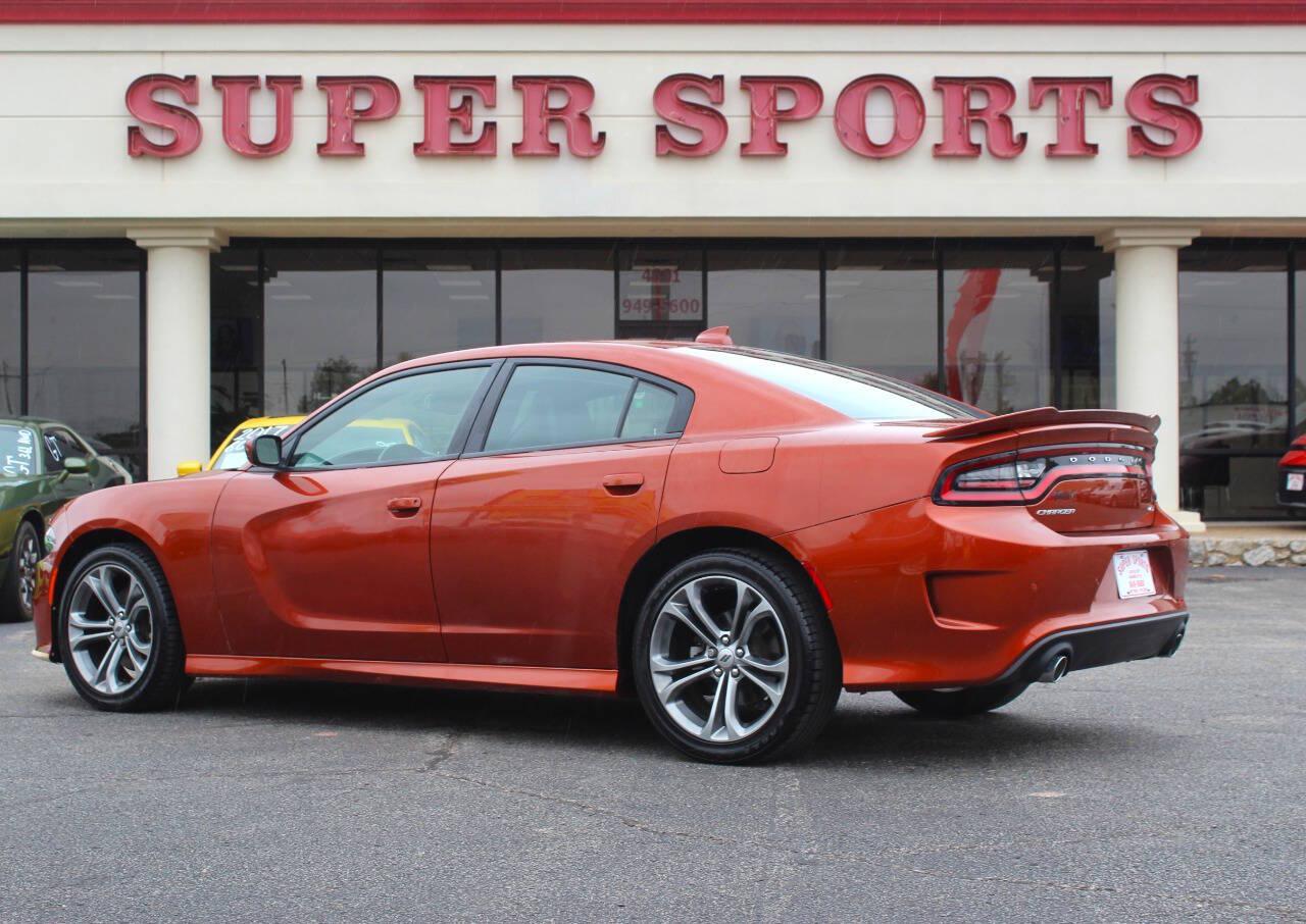 2021 Orange Dodge Charger GT AWD (2C3CDXHG3MH) with an Pentastar 3.6L V6 300hp 264ft. lbs. 3.6L V6 engine, Automatic 8-Speed transmission, located at 4301 NW 39th , Oklahoma City, OK, 73112, (405) 949-5600, 35.512135, -97.598671 - SPEND SMART --- BUY FROM SUPER SPORTS. ALL PRICES, DOWN PAYMENTS, PAYMENTS, AND FINANCE TERMS ARE NEGOTIABLE AT THE TIME OF APPROVAL. WE WILL WORK WITH YOU TO FIT YOUR BUDGET. WE WILL EVEN LOWER AND ADJUST THE NUMBERS TO HELP MAKE THE VEHICLE MORE AFFORDABLE FOR YOU. Our financing progra- Photo#4