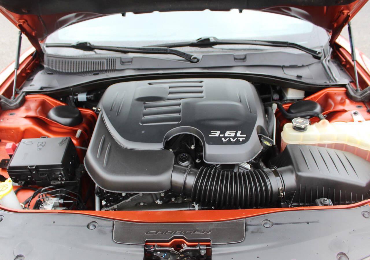 2021 Orange Dodge Charger GT AWD (2C3CDXHG3MH) with an Pentastar 3.6L V6 300hp 264ft. lbs. 3.6L V6 engine, Automatic 8-Speed transmission, located at 4301 NW 39th , Oklahoma City, OK, 73112, (405) 949-5600, 35.512135, -97.598671 - SPEND SMART --- BUY FROM SUPER SPORTS. ALL PRICES, DOWN PAYMENTS, PAYMENTS, AND FINANCE TERMS ARE NEGOTIABLE AT THE TIME OF APPROVAL. WE WILL WORK WITH YOU TO FIT YOUR BUDGET. WE WILL EVEN LOWER AND ADJUST THE NUMBERS TO HELP MAKE THE VEHICLE MORE AFFORDABLE FOR YOU. Our financing progra- Photo#7