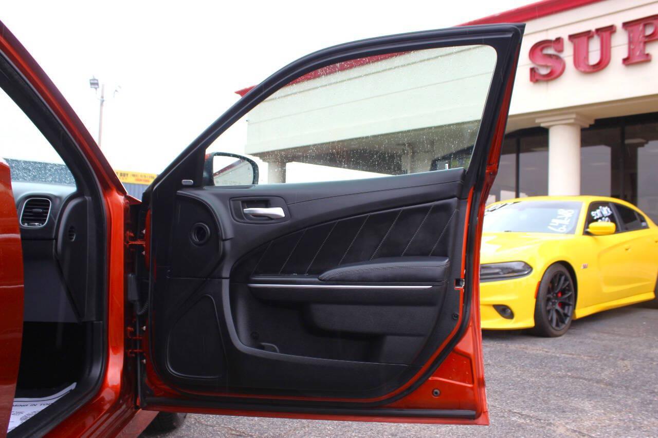 2021 Orange Dodge Charger GT AWD (2C3CDXHG3MH) with an Pentastar 3.6L V6 300hp 264ft. lbs. 3.6L V6 engine, Automatic 8-Speed transmission, located at 4301 NW 39th , Oklahoma City, OK, 73112, (405) 949-5600, 35.512135, -97.598671 - SPEND SMART --- BUY FROM SUPER SPORTS. ALL PRICES, DOWN PAYMENTS, PAYMENTS, AND FINANCE TERMS ARE NEGOTIABLE AT THE TIME OF APPROVAL. WE WILL WORK WITH YOU TO FIT YOUR BUDGET. WE WILL EVEN LOWER AND ADJUST THE NUMBERS TO HELP MAKE THE VEHICLE MORE AFFORDABLE FOR YOU. Our financing progra- Photo#8