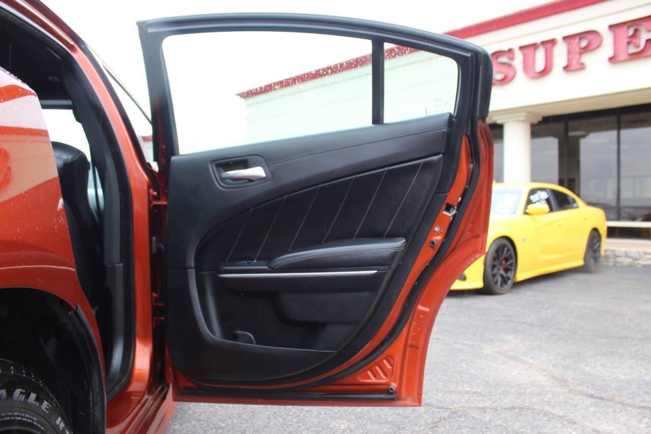 2021 Orange Dodge Charger GT AWD (2C3CDXHG3MH) with an Pentastar 3.6L V6 300hp 264ft. lbs. 3.6L V6 engine, Automatic 8-Speed transmission, located at 4301 NW 39th , Oklahoma City, OK, 73112, (405) 949-5600, 35.512135, -97.598671 - SPEND SMART --- BUY FROM SUPER SPORTS. ALL PRICES, DOWN PAYMENTS, PAYMENTS, AND FINANCE TERMS ARE NEGOTIABLE AT THE TIME OF APPROVAL. WE WILL WORK WITH YOU TO FIT YOUR BUDGET. WE WILL EVEN LOWER AND ADJUST THE NUMBERS TO HELP MAKE THE VEHICLE MORE AFFORDABLE FOR YOU. Our financing progra- Photo#10