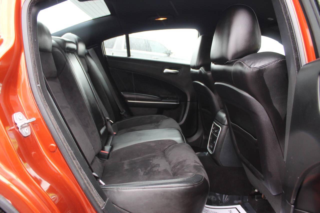 2021 Orange Dodge Charger GT AWD (2C3CDXHG3MH) with an Pentastar 3.6L V6 300hp 264ft. lbs. 3.6L V6 engine, Automatic 8-Speed transmission, located at 4301 NW 39th , Oklahoma City, OK, 73112, (405) 949-5600, 35.512135, -97.598671 - SPEND SMART --- BUY FROM SUPER SPORTS. ALL PRICES, DOWN PAYMENTS, PAYMENTS, AND FINANCE TERMS ARE NEGOTIABLE AT THE TIME OF APPROVAL. WE WILL WORK WITH YOU TO FIT YOUR BUDGET. WE WILL EVEN LOWER AND ADJUST THE NUMBERS TO HELP MAKE THE VEHICLE MORE AFFORDABLE FOR YOU. Our financing progra- Photo#11