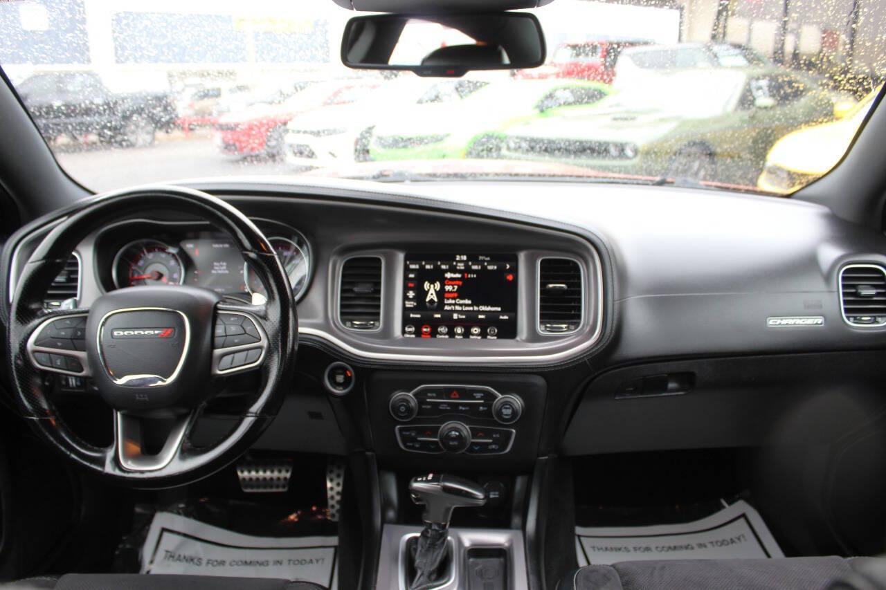 2021 Orange Dodge Charger GT AWD (2C3CDXHG3MH) with an Pentastar 3.6L V6 300hp 264ft. lbs. 3.6L V6 engine, Automatic 8-Speed transmission, located at 4301 NW 39th , Oklahoma City, OK, 73112, (405) 949-5600, 35.512135, -97.598671 - SPEND SMART --- BUY FROM SUPER SPORTS. ALL PRICES, DOWN PAYMENTS, PAYMENTS, AND FINANCE TERMS ARE NEGOTIABLE AT THE TIME OF APPROVAL. WE WILL WORK WITH YOU TO FIT YOUR BUDGET. WE WILL EVEN LOWER AND ADJUST THE NUMBERS TO HELP MAKE THE VEHICLE MORE AFFORDABLE FOR YOU. Our financing progra- Photo#16
