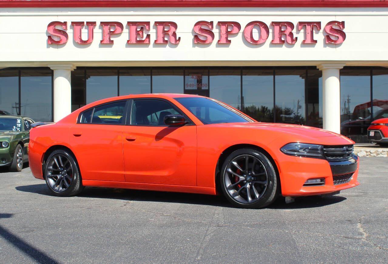2023 Orange Dodge Charger SXT (2C3CDXBG2PH) with an Pentastar 3.6L V6 292hp 260ft. lbs. 3.6L V6 engine, Automatic 8-Speed transmission, located at 4301 NW 39th , Oklahoma City, OK, 73112, (405) 949-5600, 35.512135, -97.598671 - Hablamos espanol. SPEND SMART --- BUY FROM SUPER SPORTS. ALL PRICES, DOWN PAYMENTS, PAYMENTS, AND FINANCE TERMS ARE NEGOTIABLE AT THE TIME OF APPROVAL. WE WILL WORK WITH YOU TO FIT YOUR BUDGET. WE WILL EVEN LOWER AND ADJUST THE NUMBERS TO HELP MAKE THE VE HICLE MORE AFFORDABLE FOR YOU.- Photo#0