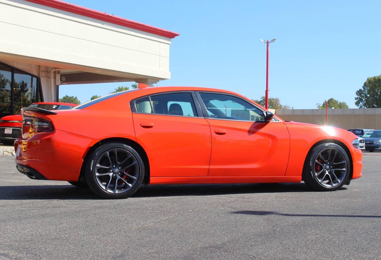 2023 Orange Dodge Charger SXT (2C3CDXBG2PH) with an Pentastar 3.6L V6 292hp 260ft. lbs. 3.6L V6 engine, Automatic 8-Speed transmission, located at 4301 NW 39th , Oklahoma City, OK, 73112, (405) 949-5600, 35.512135, -97.598671 - Hablamos espanol. SPEND SMART --- BUY FROM SUPER SPORTS. ALL PRICES, DOWN PAYMENTS, PAYMENTS, AND FINANCE TERMS ARE NEGOTIABLE AT THE TIME OF APPROVAL. WE WILL WORK WITH YOU TO FIT YOUR BUDGET. WE WILL EVEN LOWER AND ADJUST THE NUMBERS TO HELP MAKE THE VE HICLE MORE AFFORDABLE FOR YOU.- Photo#2