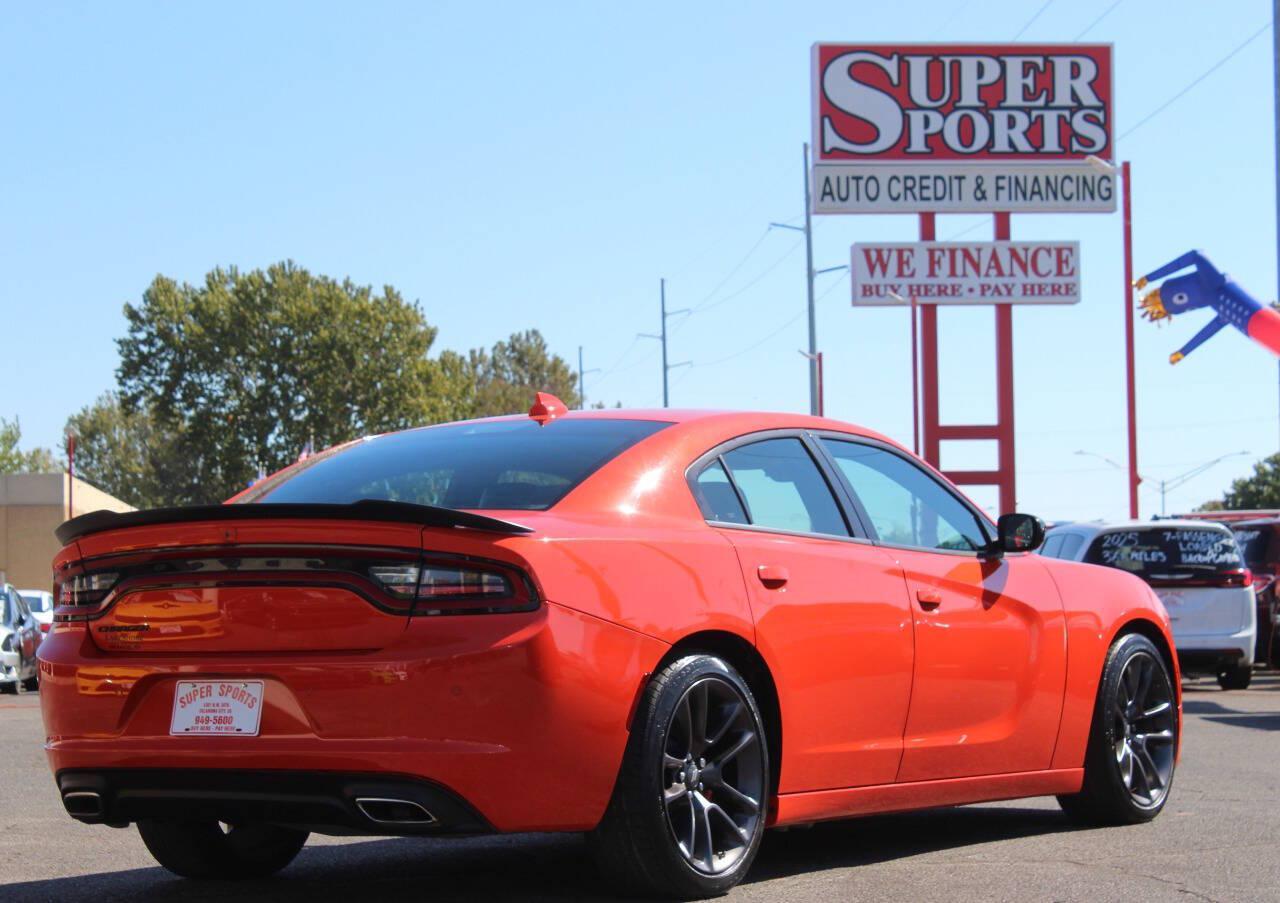 2023 Orange Dodge Charger SXT (2C3CDXBG2PH) with an Pentastar 3.6L V6 292hp 260ft. lbs. 3.6L V6 engine, Automatic 8-Speed transmission, located at 4301 NW 39th , Oklahoma City, OK, 73112, (405) 949-5600, 35.512135, -97.598671 - Hablamos espanol. SPEND SMART --- BUY FROM SUPER SPORTS. ALL PRICES, DOWN PAYMENTS, PAYMENTS, AND FINANCE TERMS ARE NEGOTIABLE AT THE TIME OF APPROVAL. WE WILL WORK WITH YOU TO FIT YOUR BUDGET. WE WILL EVEN LOWER AND ADJUST THE NUMBERS TO HELP MAKE THE VE HICLE MORE AFFORDABLE FOR YOU.- Photo#3