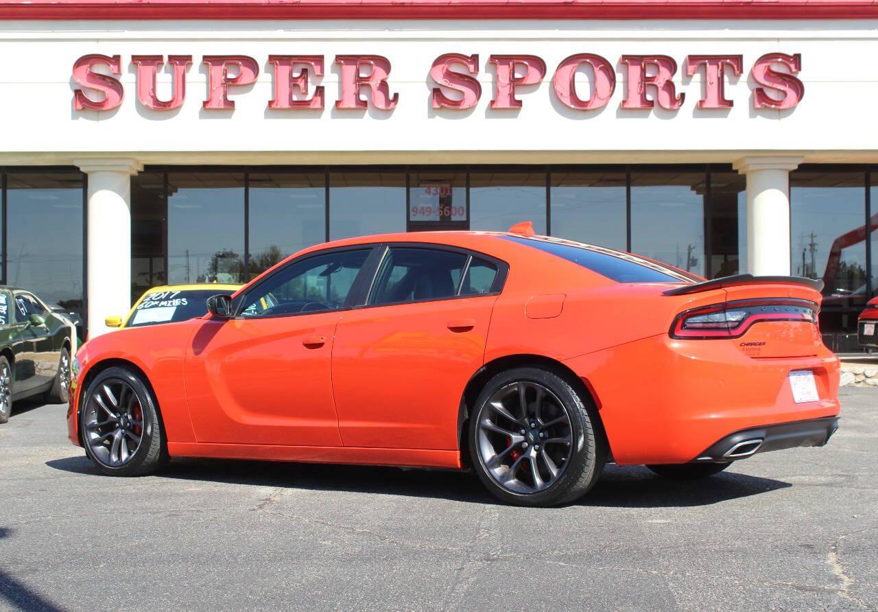 2023 Orange Dodge Charger SXT (2C3CDXBG2PH) with an Pentastar 3.6L V6 292hp 260ft. lbs. 3.6L V6 engine, Automatic 8-Speed transmission, located at 4301 NW 39th , Oklahoma City, OK, 73112, (405) 949-5600, 35.512135, -97.598671 - Hablamos espanol. SPEND SMART --- BUY FROM SUPER SPORTS. ALL PRICES, DOWN PAYMENTS, PAYMENTS, AND FINANCE TERMS ARE NEGOTIABLE AT THE TIME OF APPROVAL. WE WILL WORK WITH YOU TO FIT YOUR BUDGET. WE WILL EVEN LOWER AND ADJUST THE NUMBERS TO HELP MAKE THE VE HICLE MORE AFFORDABLE FOR YOU.- Photo#4