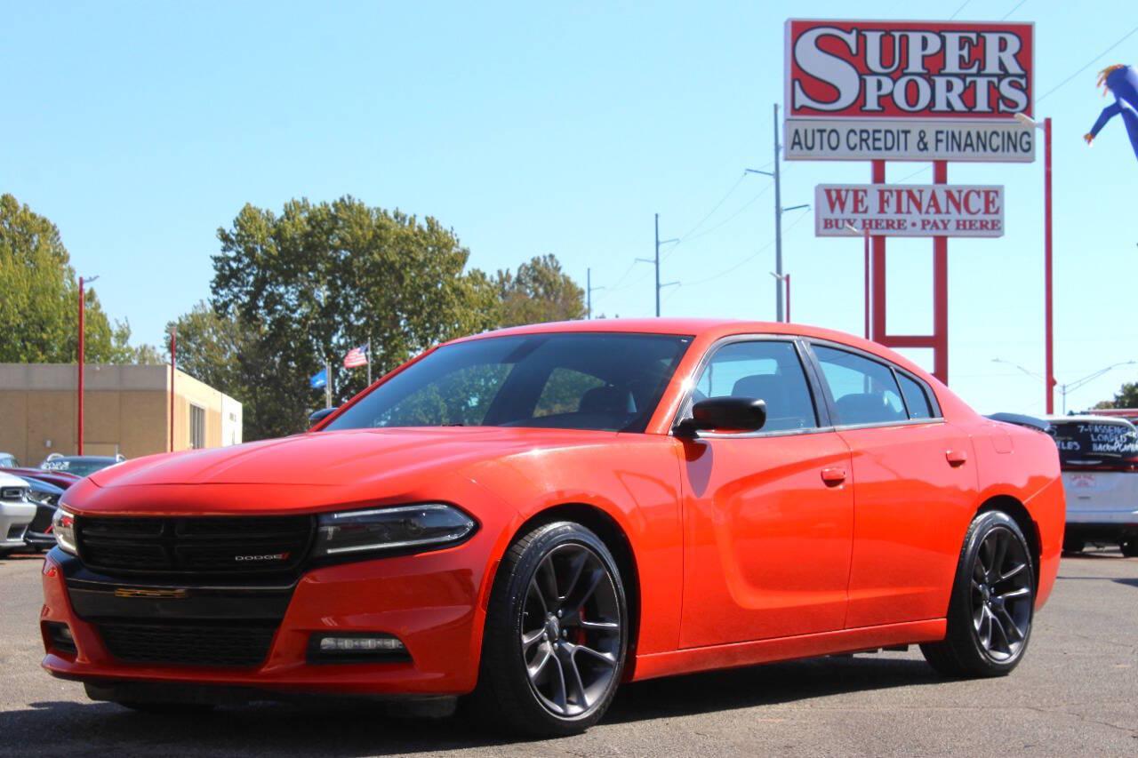 2023 Orange Dodge Charger SXT (2C3CDXBG2PH) with an Pentastar 3.6L V6 292hp 260ft. lbs. 3.6L V6 engine, Automatic 8-Speed transmission, located at 4301 NW 39th , Oklahoma City, OK, 73112, (405) 949-5600, 35.512135, -97.598671 - Hablamos espanol. SPEND SMART --- BUY FROM SUPER SPORTS. ALL PRICES, DOWN PAYMENTS, PAYMENTS, AND FINANCE TERMS ARE NEGOTIABLE AT THE TIME OF APPROVAL. WE WILL WORK WITH YOU TO FIT YOUR BUDGET. WE WILL EVEN LOWER AND ADJUST THE NUMBERS TO HELP MAKE THE VE HICLE MORE AFFORDABLE FOR YOU.- Photo#6
