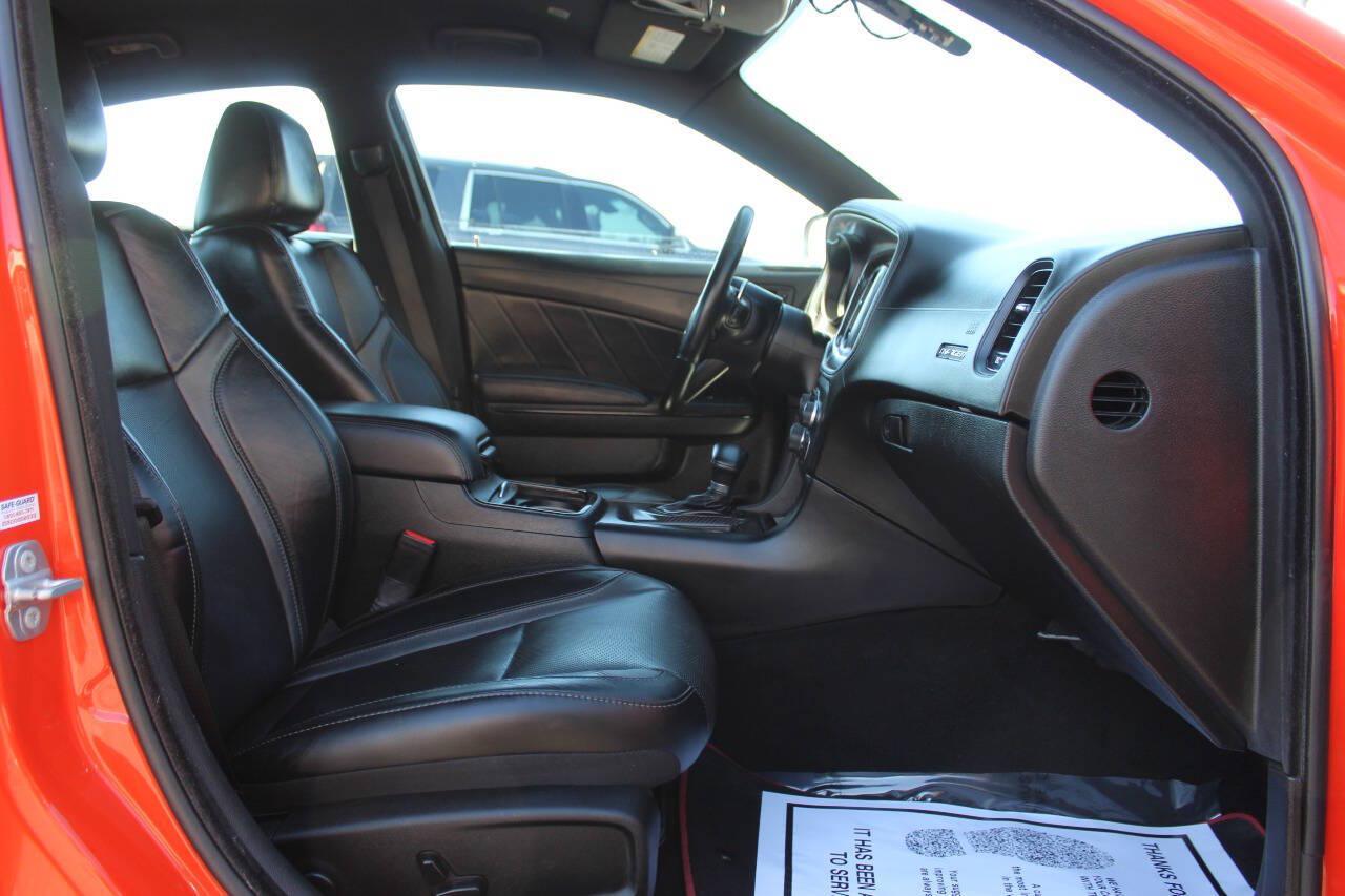 2023 Orange Dodge Charger SXT (2C3CDXBG2PH) with an Pentastar 3.6L V6 292hp 260ft. lbs. 3.6L V6 engine, Automatic 8-Speed transmission, located at 4301 NW 39th , Oklahoma City, OK, 73112, (405) 949-5600, 35.512135, -97.598671 - Hablamos espanol. SPEND SMART --- BUY FROM SUPER SPORTS. ALL PRICES, DOWN PAYMENTS, PAYMENTS, AND FINANCE TERMS ARE NEGOTIABLE AT THE TIME OF APPROVAL. WE WILL WORK WITH YOU TO FIT YOUR BUDGET. WE WILL EVEN LOWER AND ADJUST THE NUMBERS TO HELP MAKE THE VE HICLE MORE AFFORDABLE FOR YOU.- Photo#9