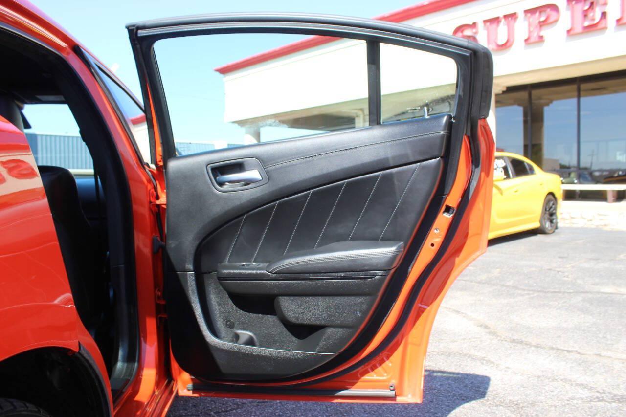 2023 Orange Dodge Charger SXT (2C3CDXBG2PH) with an Pentastar 3.6L V6 292hp 260ft. lbs. 3.6L V6 engine, Automatic 8-Speed transmission, located at 4301 NW 39th , Oklahoma City, OK, 73112, (405) 949-5600, 35.512135, -97.598671 - Hablamos espanol. SPEND SMART --- BUY FROM SUPER SPORTS. ALL PRICES, DOWN PAYMENTS, PAYMENTS, AND FINANCE TERMS ARE NEGOTIABLE AT THE TIME OF APPROVAL. WE WILL WORK WITH YOU TO FIT YOUR BUDGET. WE WILL EVEN LOWER AND ADJUST THE NUMBERS TO HELP MAKE THE VE HICLE MORE AFFORDABLE FOR YOU.- Photo#10