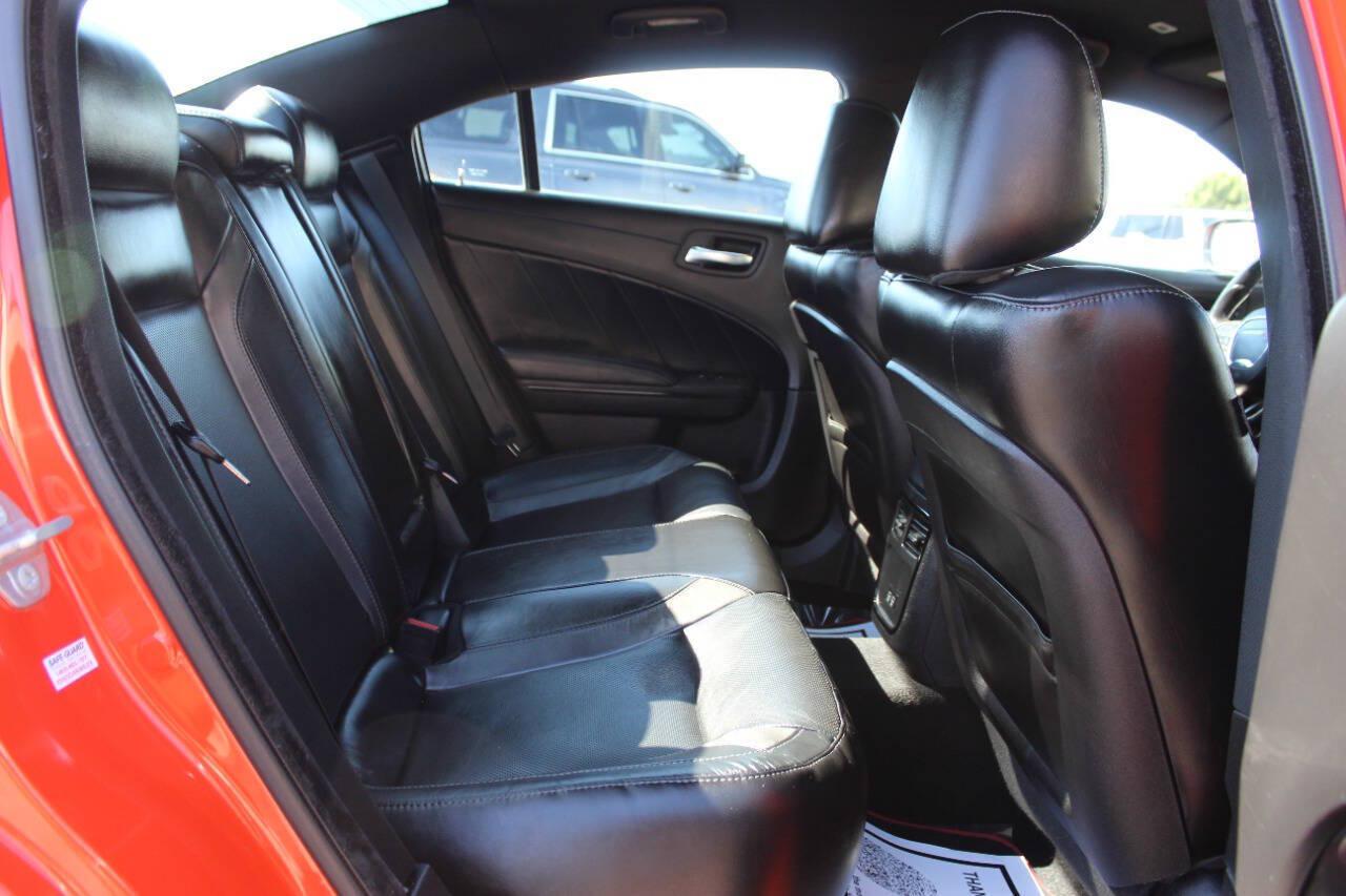 2023 Orange Dodge Charger SXT (2C3CDXBG2PH) with an Pentastar 3.6L V6 292hp 260ft. lbs. 3.6L V6 engine, Automatic 8-Speed transmission, located at 4301 NW 39th , Oklahoma City, OK, 73112, (405) 949-5600, 35.512135, -97.598671 - Hablamos espanol. SPEND SMART --- BUY FROM SUPER SPORTS. ALL PRICES, DOWN PAYMENTS, PAYMENTS, AND FINANCE TERMS ARE NEGOTIABLE AT THE TIME OF APPROVAL. WE WILL WORK WITH YOU TO FIT YOUR BUDGET. WE WILL EVEN LOWER AND ADJUST THE NUMBERS TO HELP MAKE THE VE HICLE MORE AFFORDABLE FOR YOU.- Photo#11