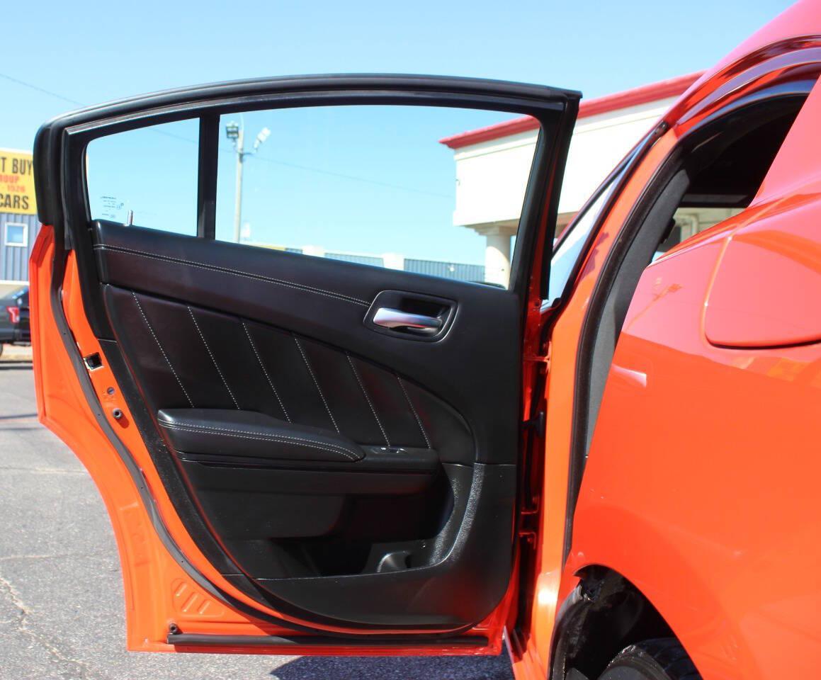 2023 Orange Dodge Charger SXT (2C3CDXBG2PH) with an Pentastar 3.6L V6 292hp 260ft. lbs. 3.6L V6 engine, Automatic 8-Speed transmission, located at 4301 NW 39th , Oklahoma City, OK, 73112, (405) 949-5600, 35.512135, -97.598671 - Hablamos espanol. SPEND SMART --- BUY FROM SUPER SPORTS. ALL PRICES, DOWN PAYMENTS, PAYMENTS, AND FINANCE TERMS ARE NEGOTIABLE AT THE TIME OF APPROVAL. WE WILL WORK WITH YOU TO FIT YOUR BUDGET. WE WILL EVEN LOWER AND ADJUST THE NUMBERS TO HELP MAKE THE VE HICLE MORE AFFORDABLE FOR YOU.- Photo#13