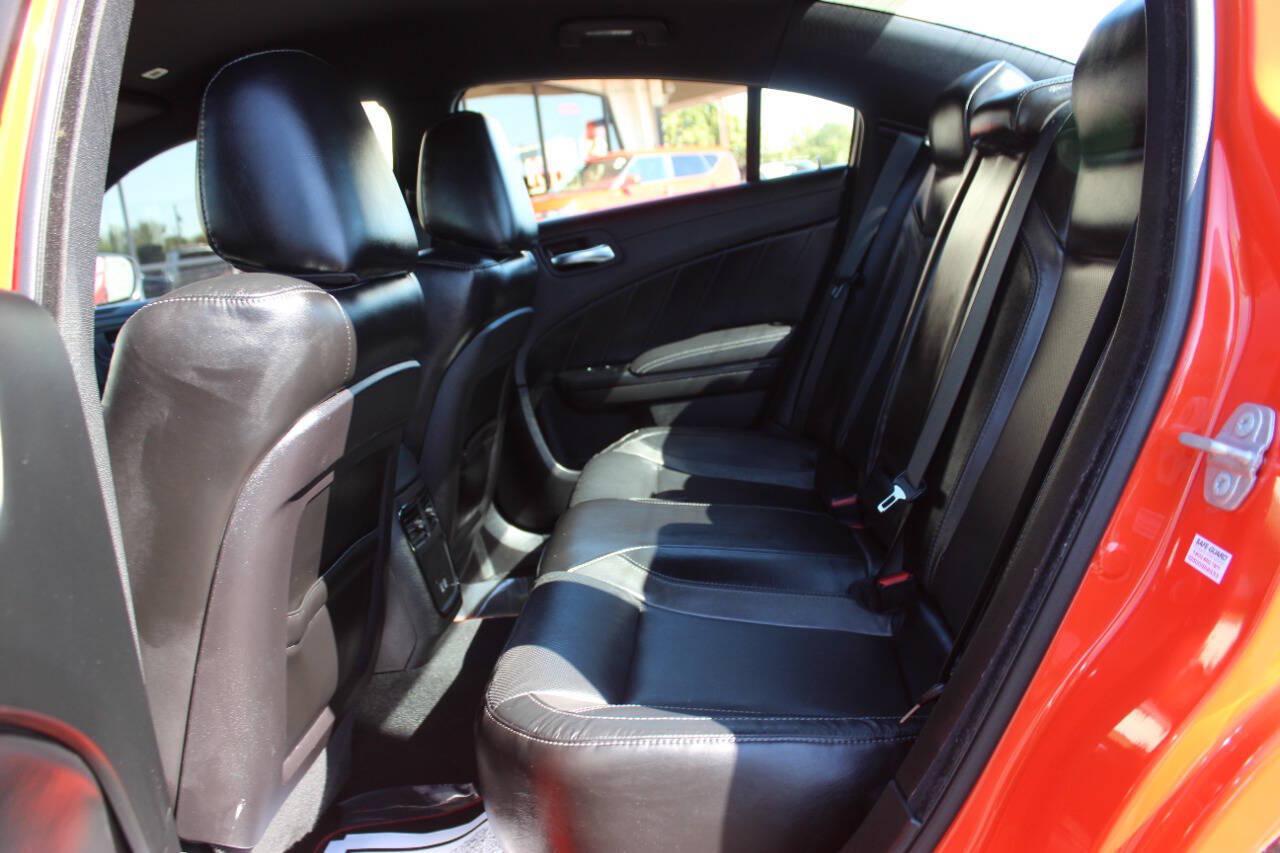 2023 Orange Dodge Charger SXT (2C3CDXBG2PH) with an Pentastar 3.6L V6 292hp 260ft. lbs. 3.6L V6 engine, Automatic 8-Speed transmission, located at 4301 NW 39th , Oklahoma City, OK, 73112, (405) 949-5600, 35.512135, -97.598671 - Hablamos espanol. SPEND SMART --- BUY FROM SUPER SPORTS. ALL PRICES, DOWN PAYMENTS, PAYMENTS, AND FINANCE TERMS ARE NEGOTIABLE AT THE TIME OF APPROVAL. WE WILL WORK WITH YOU TO FIT YOUR BUDGET. WE WILL EVEN LOWER AND ADJUST THE NUMBERS TO HELP MAKE THE VE HICLE MORE AFFORDABLE FOR YOU.- Photo#14