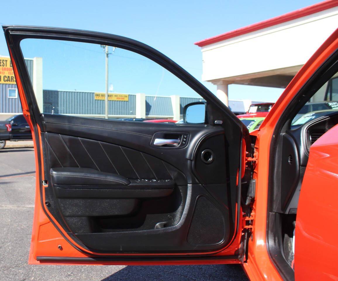 2023 Orange Dodge Charger SXT (2C3CDXBG2PH) with an Pentastar 3.6L V6 292hp 260ft. lbs. 3.6L V6 engine, Automatic 8-Speed transmission, located at 4301 NW 39th , Oklahoma City, OK, 73112, (405) 949-5600, 35.512135, -97.598671 - Hablamos espanol. SPEND SMART --- BUY FROM SUPER SPORTS. ALL PRICES, DOWN PAYMENTS, PAYMENTS, AND FINANCE TERMS ARE NEGOTIABLE AT THE TIME OF APPROVAL. WE WILL WORK WITH YOU TO FIT YOUR BUDGET. WE WILL EVEN LOWER AND ADJUST THE NUMBERS TO HELP MAKE THE VE HICLE MORE AFFORDABLE FOR YOU.- Photo#15