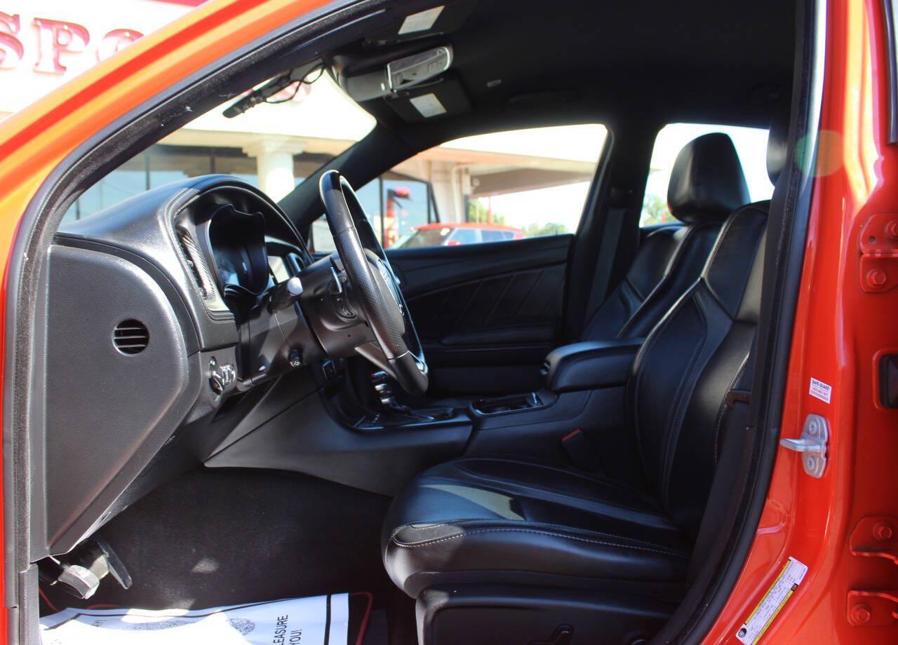 2023 Orange Dodge Charger SXT (2C3CDXBG2PH) with an Pentastar 3.6L V6 292hp 260ft. lbs. 3.6L V6 engine, Automatic 8-Speed transmission, located at 4301 NW 39th , Oklahoma City, OK, 73112, (405) 949-5600, 35.512135, -97.598671 - Hablamos espanol. SPEND SMART --- BUY FROM SUPER SPORTS. ALL PRICES, DOWN PAYMENTS, PAYMENTS, AND FINANCE TERMS ARE NEGOTIABLE AT THE TIME OF APPROVAL. WE WILL WORK WITH YOU TO FIT YOUR BUDGET. WE WILL EVEN LOWER AND ADJUST THE NUMBERS TO HELP MAKE THE VE HICLE MORE AFFORDABLE FOR YOU.- Photo#16