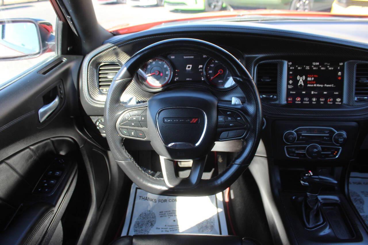 2023 Orange Dodge Charger SXT (2C3CDXBG2PH) with an Pentastar 3.6L V6 292hp 260ft. lbs. 3.6L V6 engine, Automatic 8-Speed transmission, located at 4301 NW 39th , Oklahoma City, OK, 73112, (405) 949-5600, 35.512135, -97.598671 - Hablamos espanol. SPEND SMART --- BUY FROM SUPER SPORTS. ALL PRICES, DOWN PAYMENTS, PAYMENTS, AND FINANCE TERMS ARE NEGOTIABLE AT THE TIME OF APPROVAL. WE WILL WORK WITH YOU TO FIT YOUR BUDGET. WE WILL EVEN LOWER AND ADJUST THE NUMBERS TO HELP MAKE THE VE HICLE MORE AFFORDABLE FOR YOU.- Photo#17