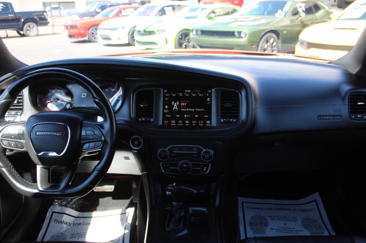 2023 Orange Dodge Charger SXT (2C3CDXBG2PH) with an Pentastar 3.6L V6 292hp 260ft. lbs. 3.6L V6 engine, Automatic 8-Speed transmission, located at 4301 NW 39th , Oklahoma City, OK, 73112, (405) 949-5600, 35.512135, -97.598671 - Hablamos espanol. SPEND SMART --- BUY FROM SUPER SPORTS. ALL PRICES, DOWN PAYMENTS, PAYMENTS, AND FINANCE TERMS ARE NEGOTIABLE AT THE TIME OF APPROVAL. WE WILL WORK WITH YOU TO FIT YOUR BUDGET. WE WILL EVEN LOWER AND ADJUST THE NUMBERS TO HELP MAKE THE VE HICLE MORE AFFORDABLE FOR YOU.- Photo#18